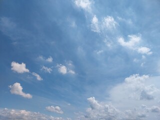 Obraz premium Fluffy White Clouds Gathering Up