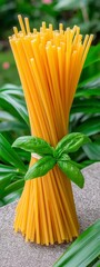 Golden Yellow Spaghetti Bundle with Fresh Basil Leaves