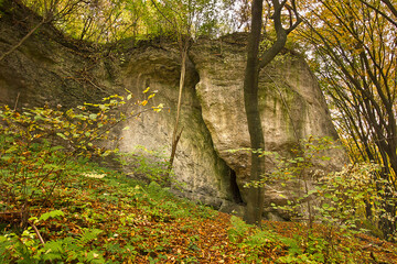 Autumn landscape with picturesque rocks in the forest. Nature of Poland