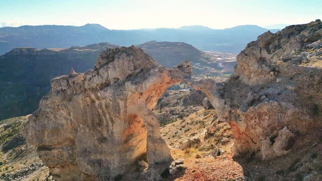 natural formations of rocks, bridges, holes, passage texture