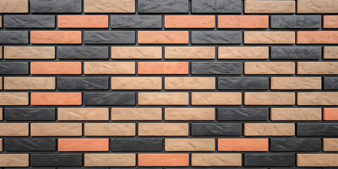 Fototapeta premium Mixed earth tone brick wall featuring orange, gray, tan and cream colored bricks arranged in traditional running bond masonry pattern layout.