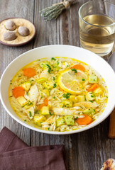 Lemon chicken orzo soup. Recipe. Italian food.