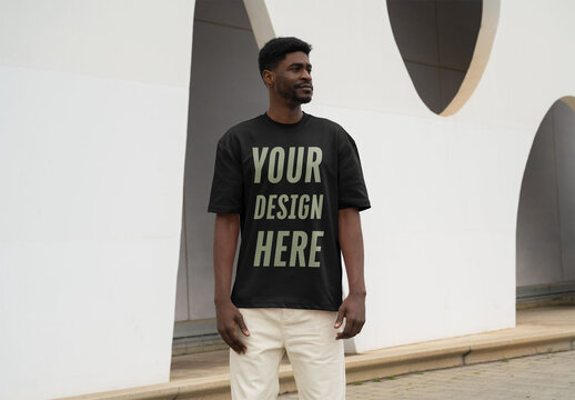Mockup Of Man Dressed In Customizable T-Shirt Outdoors