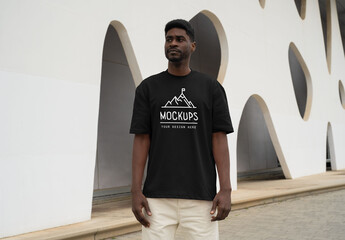 Mockup Of Man Dressed In Customized T-Shirt Outdoors