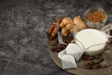 Spices for Indian masala chai tea on a metal try