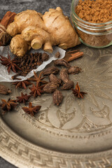 Spices for Indian masala chai tea on a metal try