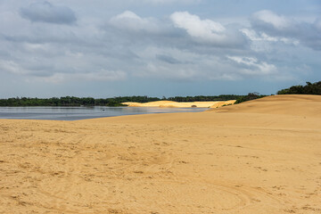 Dunes and lagoons of Vassouras, Lencois Maranhenses, Barreirinhas, Brazil. White sand dunes with...