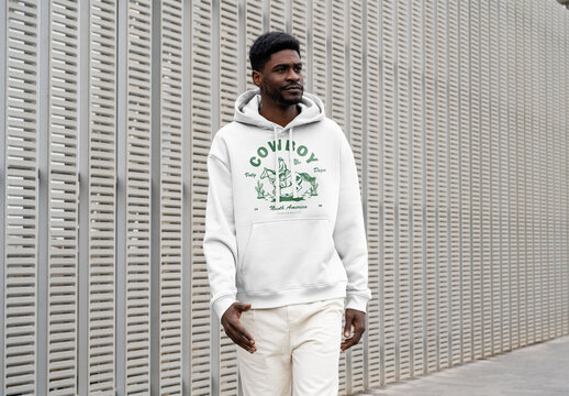 Mockup Of Man Dressed In Customizable Hoodie, Outdoors
