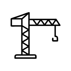 Construction crane working on a building site during daylight hours in an urban setting with clear skies