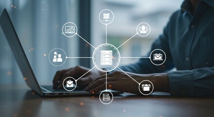 Person working on a laptop with interconnected data icons