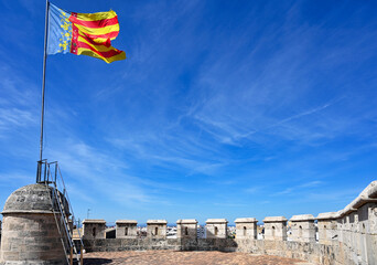 Community of Valencia flag on top of the Quart Towers, Valencia,Spain
