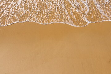 Gentle Waves on Golden Sand