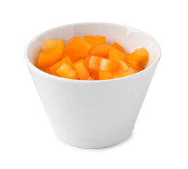 Pieces of fresh orange bell peppers in bowl isolated on white