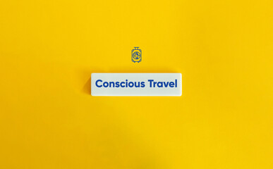 Conscious Travel Letter Tile on Yellow Background – Minimalist Sustainability and Ethical Tourism Concept