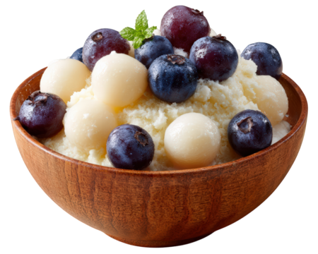 Creamy shaved ice dessert topped with fresh blueberries and chewy mochi balls, served in wooden bowl. This delightful treat is perfect for refreshing snack or dessert