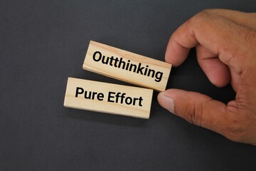 What are the two types of hard work? Outthinking, Pure Effort