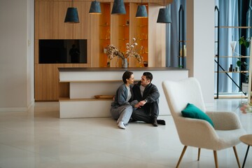 Couple enjoying quality time in a modern living room setting