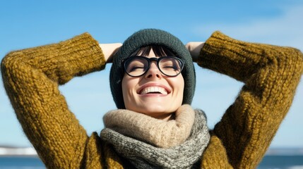 Happy woman, winter seaside, relaxing, clear sky, joyful, travel
