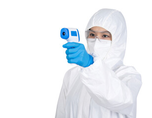 A healthcare worker in full protective gear holds a digital infrared thermometer aimed forward for temperature screening.