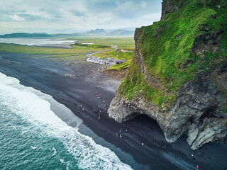 Aerial scenic view of Reynisfjara black sand beach near Vik in Southern Iceland.