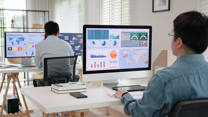 Asia people expert man tech talent working on project predict sales insight SEO graph chart AI smart plan visual big data science report center BI smart tools screen. Office worker asian analyst job.
