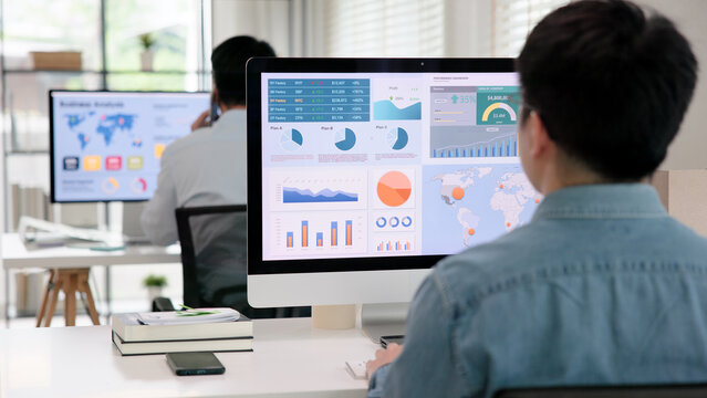 Asia people expert man tech talent working on project predict sales insight SEO graph chart AI smart plan visual big data science report center BI smart tools screen. Office worker asian analyst job.