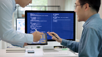 Smart AI cyber bot deep tech tools help write prompt code screen. Asia people asian man IT team...