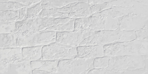 gray stone brick wall is shown in a close up view. the rough texture and mortar joints are visible, creating a uniform pattern across the surface of the grey wall background.
