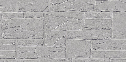 exterior wall with grey stone blocks in varying sizes and a rough textured surface create pattern the wall is solid.