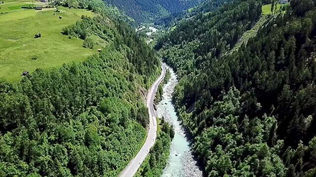A drone shot of the Tyrolean mountains with river Inn