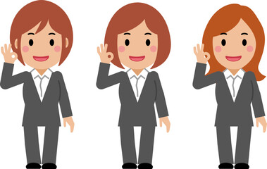 笑顔でOKサインを出すグレースーツの若い女性