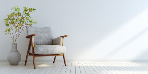 A gray armchair in a minimalist room with a plain white wall. A gray armchair in a minimalist room with a plain white wall.