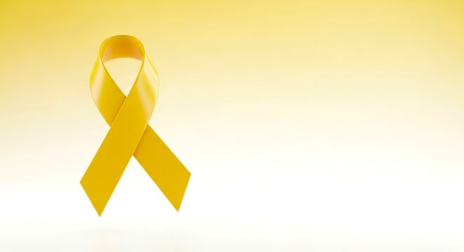 Sarcoma Cancer Awareness Month concept. Yellow ribbon on yellow white gradient background. Symbolic for Bone and Childhood Cancer, Suicide prevention day, Endometriosis week. Banner with copy space. - Powered by Adobe