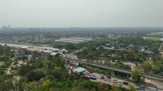 An Aerial Shot of Delhi Metro at Kalindi Kunj Bridge in Delhi, NCR, India
