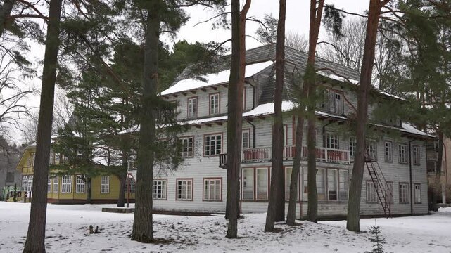 Old, stylish, retro sea resort house during winter. Abandoned summer villa. Lonely, scary, cold place.