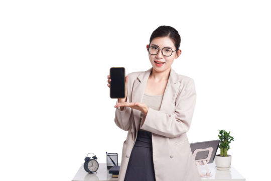 Asian businesswoman posing with smartphone, behind her is a table with lots of documents