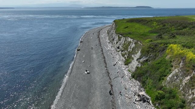 Tilting drone shot of Whidbey Island's Fort Casey beach.