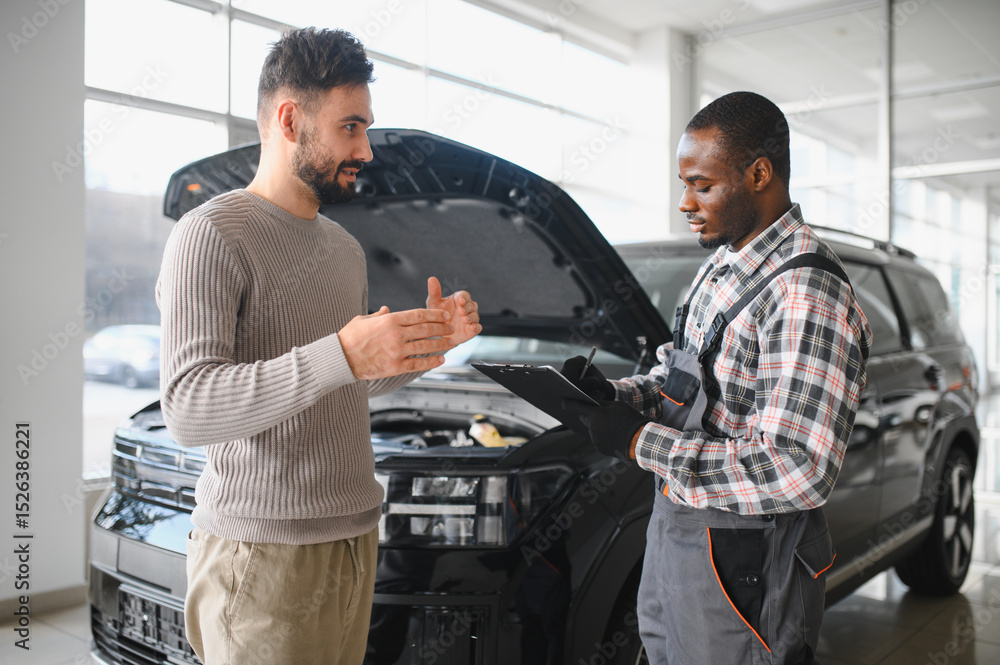 Poster Man on the result of the work of a mechanic. The client evaluates the repair of the car by a mechanic