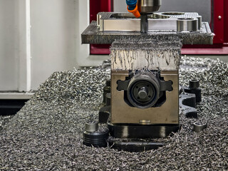 Metal machining process showcases intricate details and precise engineering in a workshop setting during daylight hours