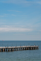 Obraz premium Pier in Gdynia in Poland on cloudy sky in summer