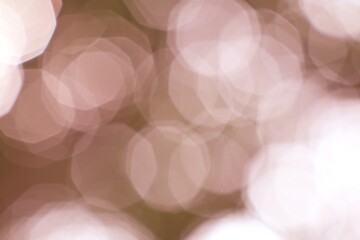 Softly Glowing Orbs in Gentle Blush Tones Abstract Background