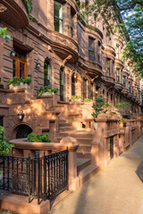 Manhattan brownstone and townhouse facades in summer. Upper West Side Central Park West Historic...