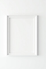 Clean background wall with empty photo frame (can be removed or replaced), even tone