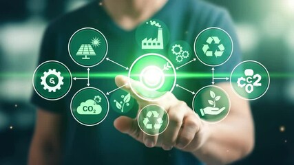 A person touching a glowing screen with icons representing sustainability and environmental awareness