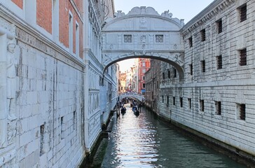 Venice, Italy - Gondolas sailing under the Bridge of Sighs in Venice