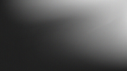 Abstract black and white gradient background with subtle grainy texture and soft tones