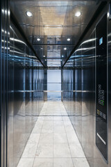 Modern elevator interior in a residential building showcasing elegant design elements © brizmaker