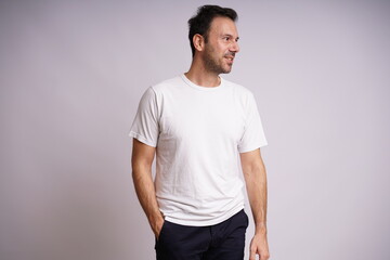 Obraz premium Male Model Showing Different Emotions on White Studio Background