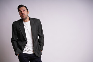 Male Model Showing Different Emotions on White Studio Background