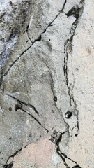 The texture of the rocks with natural cracks depicts solidity.